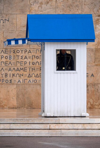 Guard of the Greek Evzonov Guards at grave of Unknown Soldier on Syntagma Square in Athens