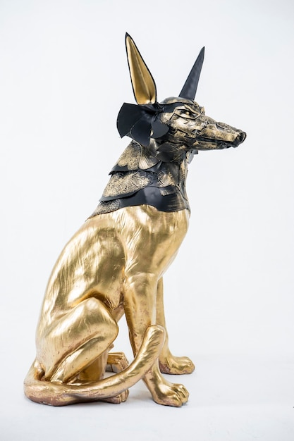 Guard, sculpture of the Egyptian god Anubis, gold figure and black jackal