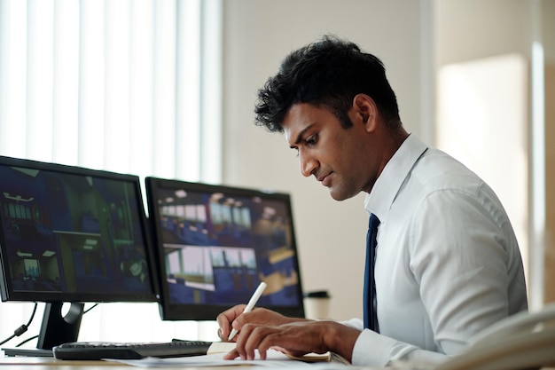 Guard Working in Surveillance Room