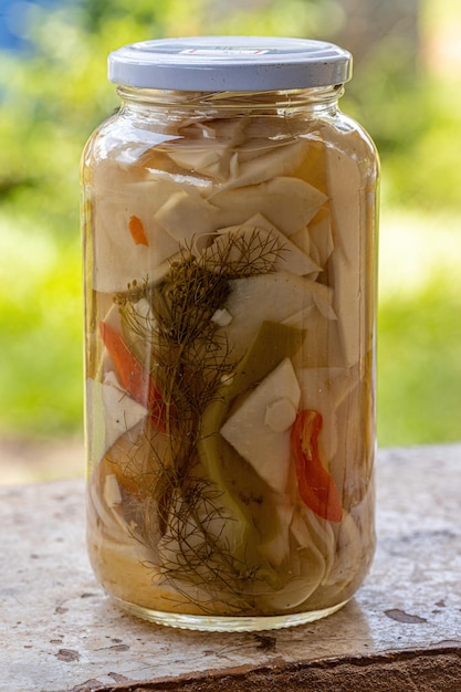 Guariroba preserves in a container with selective focus