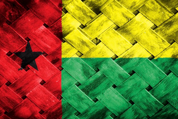 guinea bissau flag screen on wicker wood background