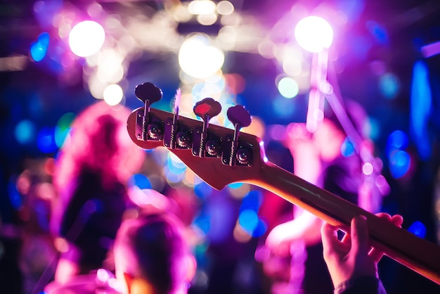 Guitar neck at a live concert closeup