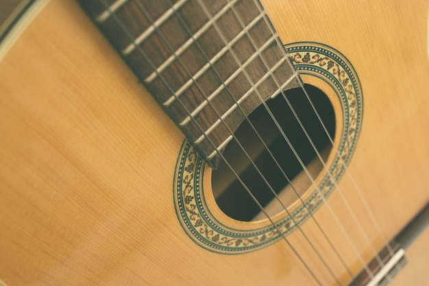 Guitar sound hole vintage color tone.