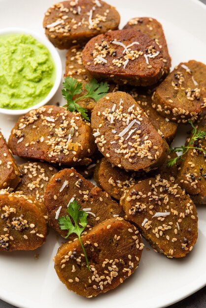 Gujarati snacks Muthiya or muthia is a steam cooked healthy food made using bottle gourd or doodhi or lauki