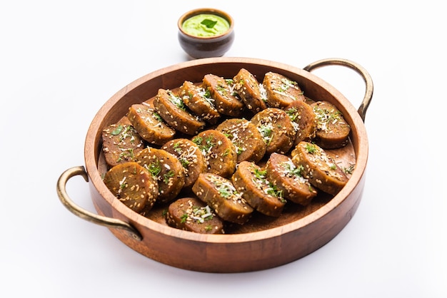 Gujarati snacks Muthiya or muthia is a steam cooked healthy food made using bottle gourd or doodhi or lauki