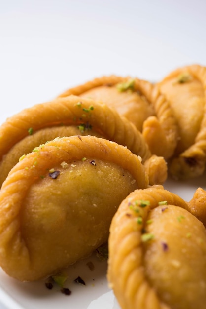 Gujiya - sweet dumplings made during the festival of holi and diwali, selective focus