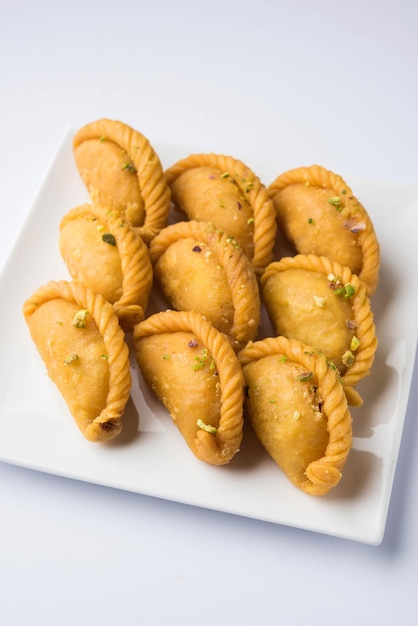 Gujiya - sweet dumplings made during the festival of holi and diwali, selective focus