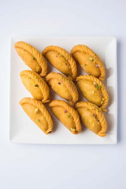 Gujiya - sweet dumplings made during the festival of holi and diwali, selective focus