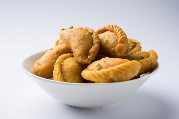 Gujiya - sweet dumplings made during the festival of holi and diwali, selective focus