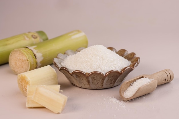 Photo gula pasir putih or white sand sugar with sugar cane