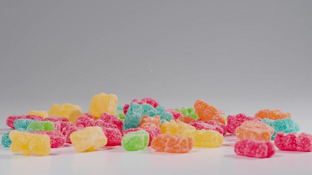 Photo gummy bear candies falls in slow motion