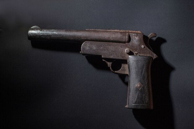 Gun on a black background