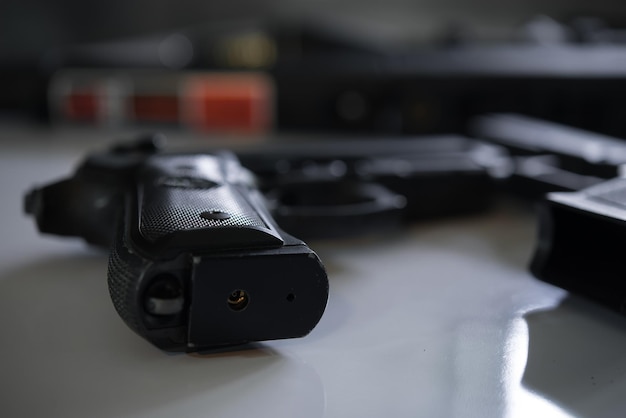 Gun and bullet on the desk