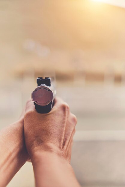 Gun in the hands of a girl Shooting With Gun