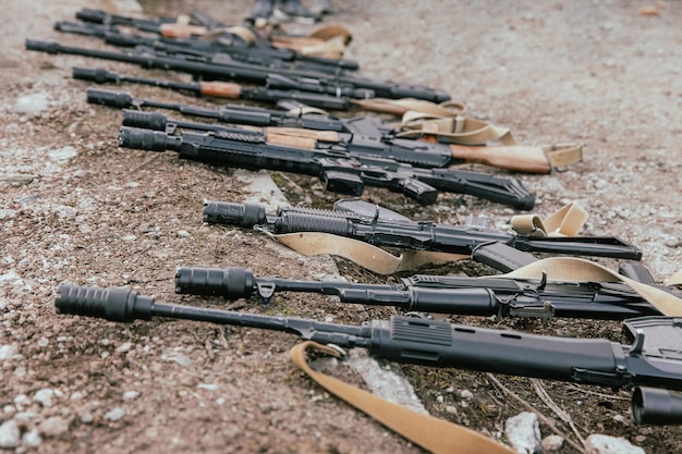 Gun of a soldier on the ground war Military automatic guns