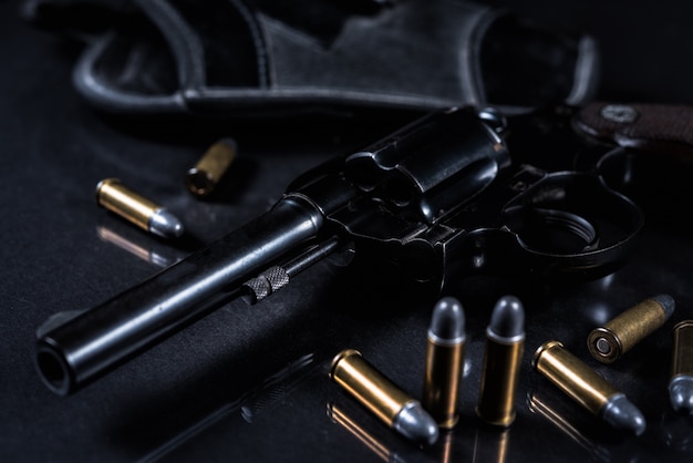 Gun with on black background