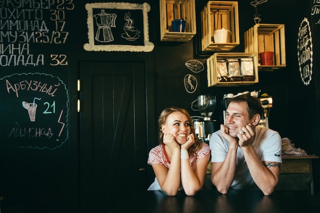 Guy and a girl meeting in a city stylized cafe