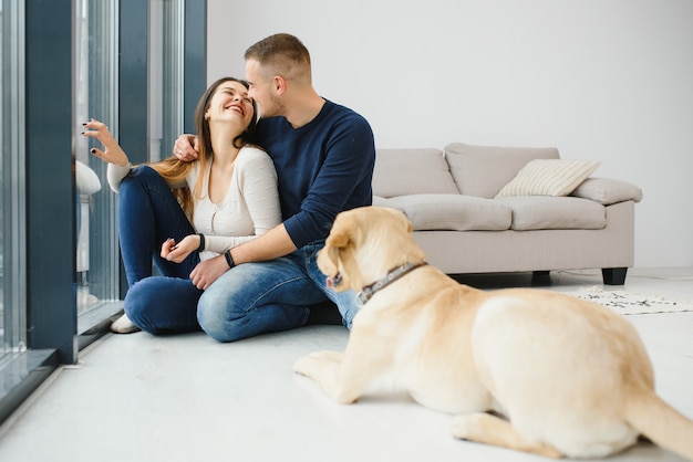 Guy and his girlfriend are resting in bedroom