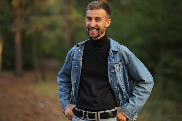 The guy laughs Happy guy A man in nature Guy on a walk in the fall