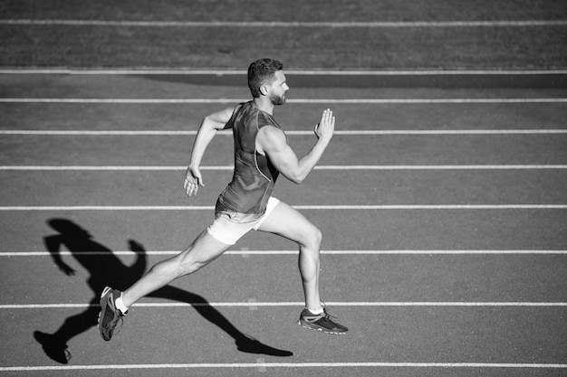 Guy sprinter running from start to finish with success and speed sport and health