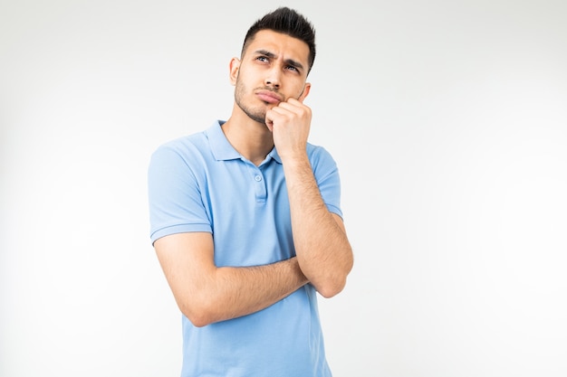 Guy with a blue shirt thinking about an idea