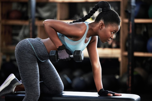 Premium Photo  Gym dumbbell or strong black woman on bench training  exercise or workout for powerful arms or muscles wellness health club or  african girl lifting weights or exercising shoulders with