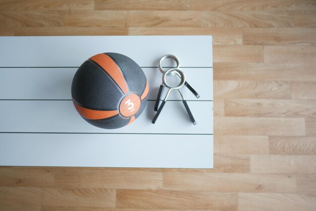 Gym equipment or dumbbell kettlebell in a gym bench