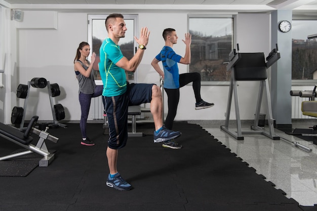 Gym People Stretching And Looking Very Happy