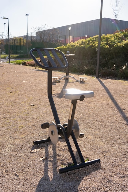 Gymnastics equipment for stationary bicycle in a public park in the city