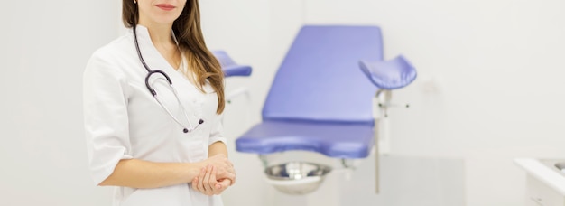 Gynecological cabinet with chair and female doctor