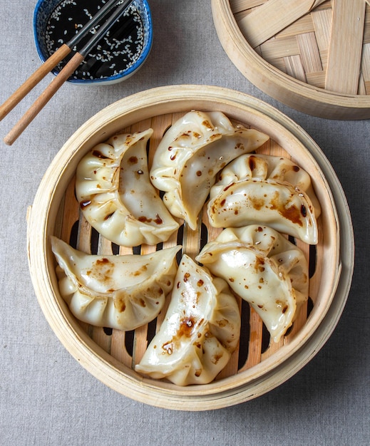 Gyoza Japanese korean dumplings on gray plate on the table top view