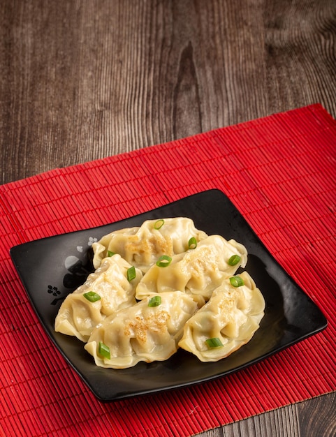 Foto gyoza o jiaozi cibo tradizionale cinese e giapponese