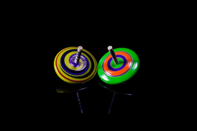 Gyroscopes toy on black.