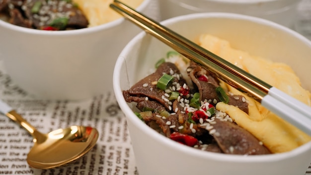 Gyutan Don is a Japanese food that is made from grilled beef tongue