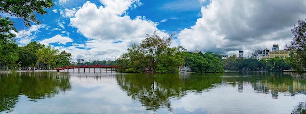 Ha Noi VIETNAM MAY 08 2023 Red Bridge The Huc Bridge in Hoan Kiem Lake his is a lake in the historical center of Hanoi the capital city of Vietnam