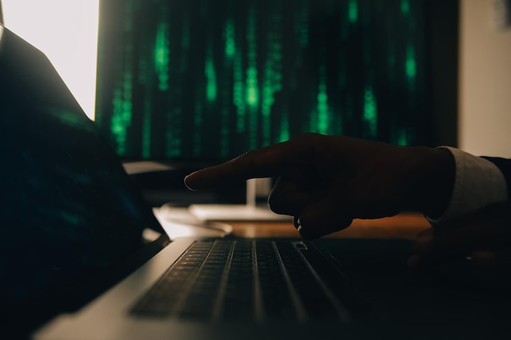 Photo hacker code in laptop cyber security privacy or hack threat coder or programmer writing virus software malware internet attack or developing digital design green web data in computer screen