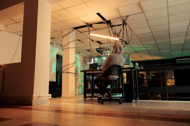 Hacker coding malware stealing banking account data