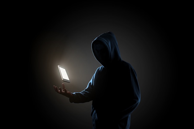 Hacker in dark background concept