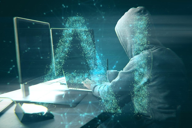 Hacker at dark desktop using computer with abstract AI hologram on blurry background Artificial intelligence and information concept Multiexposure