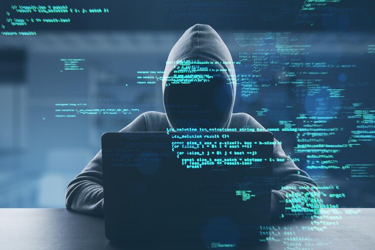 Photo hacker at desk using laptop with creative coding html language on blurry office interior background web developer hacking malware and programming concept double exposure