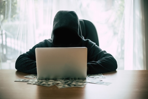 Hacker in front of his computer 