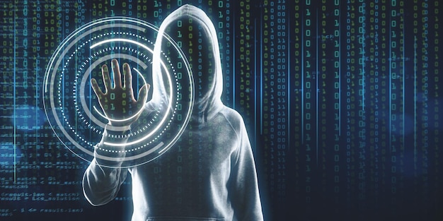 Hacker in hoodie standing on abstract binary code background with face recognition interface and mock up place Hacking ID and innovation concept Double exposure
