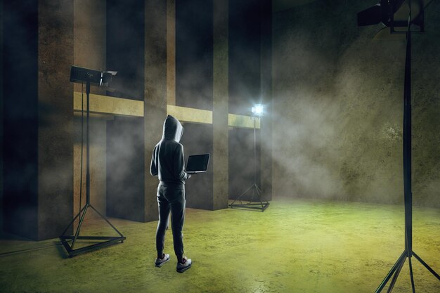 Photo hacker in smoky room