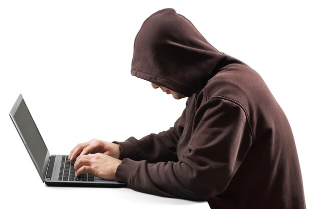 Hacker using laptop. Hacking the Internet.