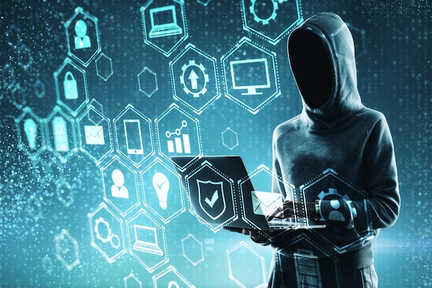 Hacker using laptop with digital business interface hologram Criminal and technology concept Double exposure