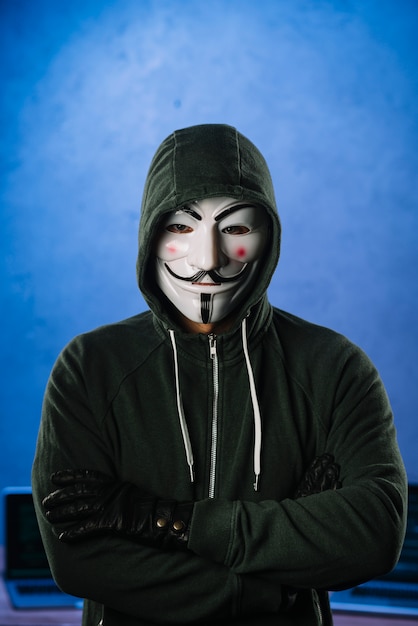 Photo hacker with anonymous mask