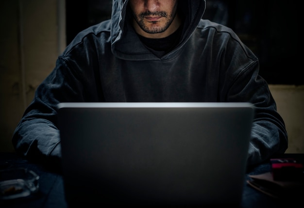 Hacker working on computer cyber crime