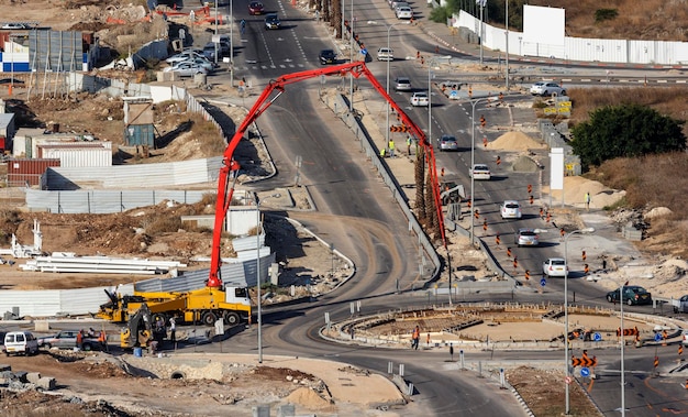 Haifa, Israel-6 November 2012 Mobile crane for pouring concrete construction circle