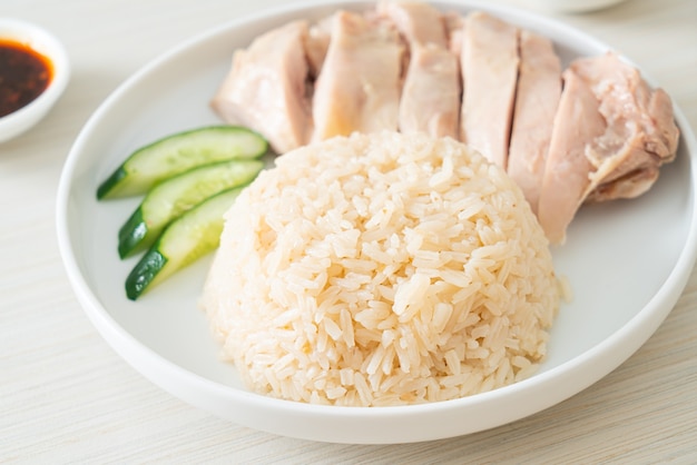 Hainanese chicken rice or rice steamed with chicken soup - Asian food style