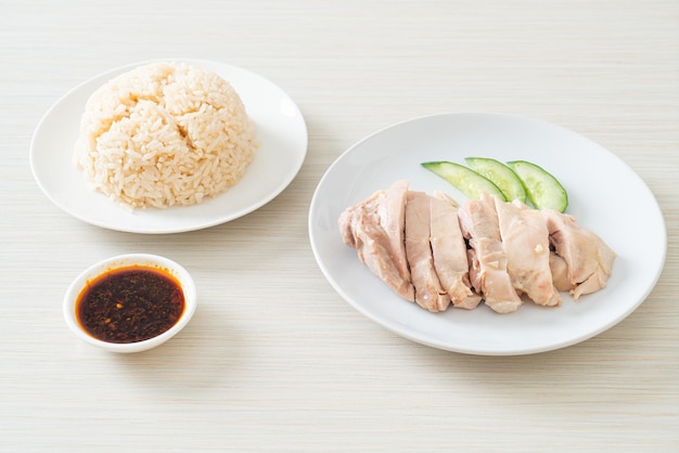 Hainanese chicken rice or rice steamed with chicken soup - Asian food style